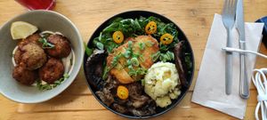 Japan bowl : Breaded vegetable chicken, miso eggplant, cold mashed potato with olive oil and fleur de sel, sesame kale and spinach shoots with ginger-soy sauce, snacked portobello, at Mōpa in Paris