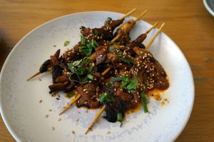 Oyster mushroom skewers at Mōpa in Paris