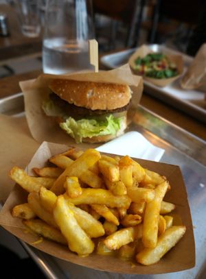 Burger + Fries w/cheddar at Mōpa in Paris