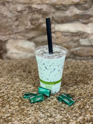 Mint Chocolate Chip Shake made with Gelato and garnished with Andes 😋 😘 at Rawfully Yours Juice Bar & Cafe in Lasalle