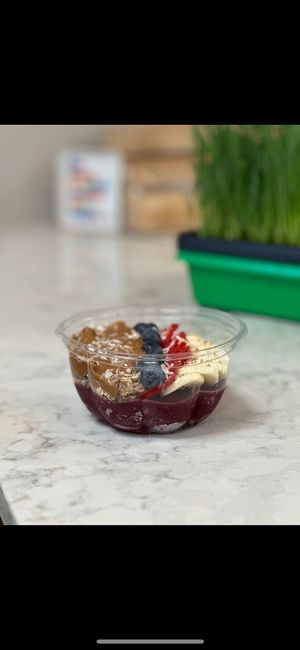 Our popular Acai Bowl!! It is a bowlful of goodness that will leave you licking your lips. at Rawfully Yours Juice Bar & Cafe in Lasalle