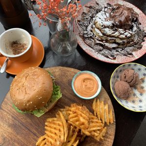 Chicken burger is so good! The waffle fries are perfectly cooked, crispy on the outside, fluffy on the inside and seasoned so well! The spicy sauce is so good!!  at Lisica Cafe in Maribyrnong
