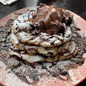 Choc chip pancakes with brownie pieces and chocolate ice cream at Lisica Cafe in Maribyrnong