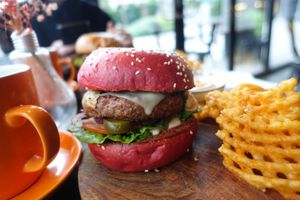 Delicious vegan cheese burger! Has pickles and relish to dieee for! Waffle fries are also the best!  at Lisica Cafe in Maribyrnong