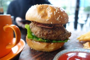 Vegan chicken burger with a mock chicken pattie at Lisica Cafe in Maribyrnong