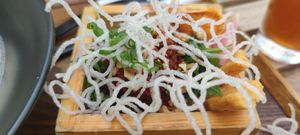Basket with toppings for ramen at Uki Green in Warsaw