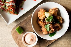 Vegan popcorn cauliflower in southern spiced panko crumb with spicy mayo and lime  at The Queens Head in Farnham