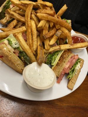 Club sandwich with fries and the most amazing ranch  at Follow Your Heart Market & Cafe in Canoga Park