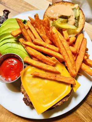 FYH Burger w/ vegan cheese and sweet potato fries at Follow Your Heart Market & Cafe in Canoga Park