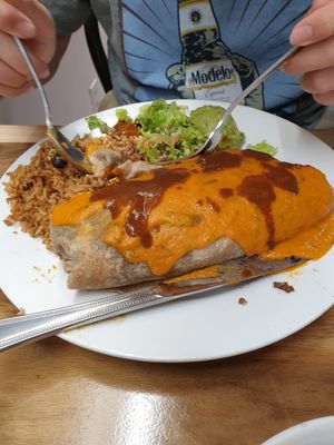 breakfast burrito.. wet at Follow Your Heart Market & Cafe in Canoga Park