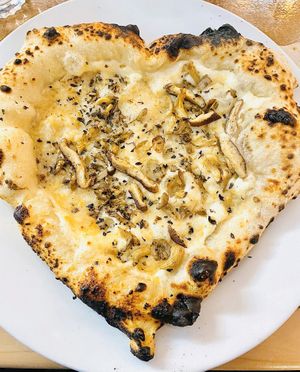 Garlic cream, mushrooms, oregano & truffle oil pizza✨ Valentines day special by the talented Chef Proof’s Place✨Delicious!  at Follow Your Heart Market & Cafe in Canoga Park