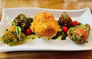 Caprese Katsu: panko crusted & deep fried housemade mozzarella w/ fresh heirloom tomatoes & basil pesto✨Valentines day special by the talented Chef Proof’s Place✨Delicious!  at Follow Your Heart Market & Cafe in Canoga Park