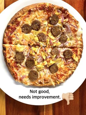 The crust was tough, and nearly inedible. I expect better from FYH. Expensive and I don’t recommend at all. May/2024.  at Follow Your Heart Market & Cafe in Canoga Park