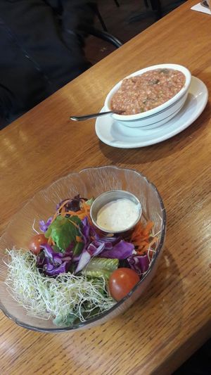 Bowl of soup and side salad at Follow Your Heart Market & Cafe in Canoga Park