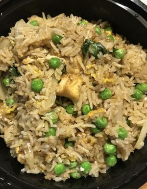 Green Thai Curry Rice with Tofu
(For vegan option, ask them to hold the egg.)

Edit 3/21/23:  turns out they use fish sauce and oyster sauce in this dish, so this is not suitable for vegans. at Everest Kitchen in Wendell