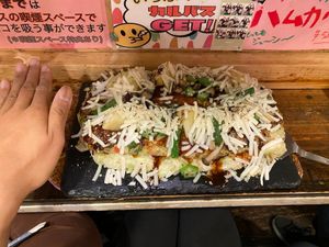 Hand for size at OKO Okonomiyaki in Osaka