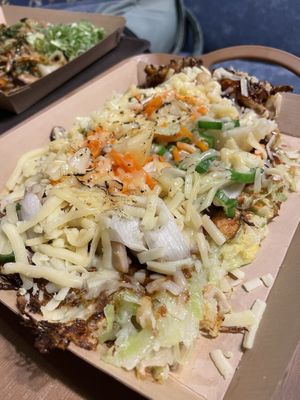 Okonomiyaki (with cheese but they have vegan cheese options)   at OKO Okonomiyaki in Osaka