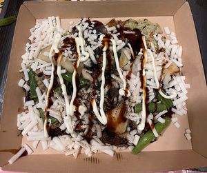 Vegan okonomiyaki with vegan cheesee  at OKO Okonomiyaki in Osaka