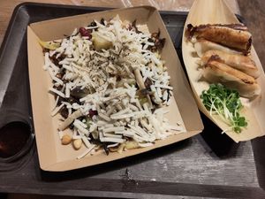 Okonomiyaki with vegan cheese and Dumplings at OKO Okonomiyaki in Osaka