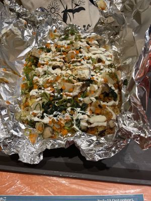 Vegetarian okinomiyaki with potato, mushroom, spinach, long onion, and carrots  at OKO Okonomiyaki in Osaka