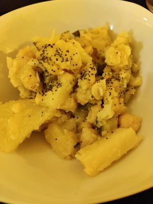 Potato and chickpea salad for the menu starter at CactusCat Bar in Barcelona