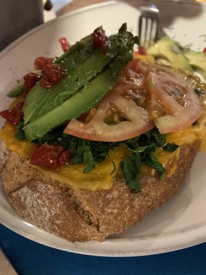 Tomato avocado toast  at CactusCat Bar in Barcelona