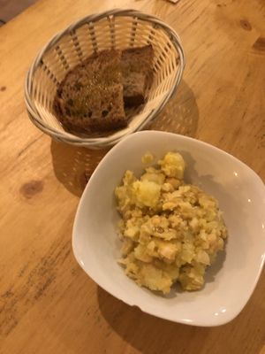 Kartoffel/ Kichererbsensalat mit getostem Brot  at CactusCat Bar in Barcelona