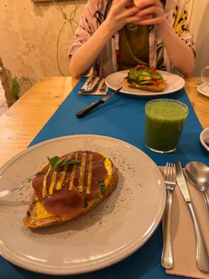 Cheese and ham toast, and an avocado toast at CactusCat Bar in Barcelona