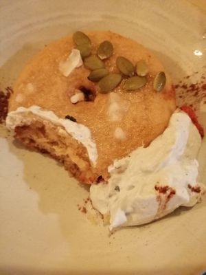 Apple Donut with coconut spirulina cream at CactusCat Bar in Barcelona