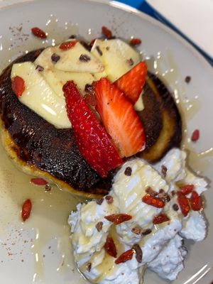 pancakes with spirulina-coconut-whipped cream at CactusCat Bar in Barcelona