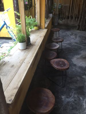 Seating along window at The Kom in Hoi An
