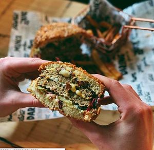 Double DARING Foods plant-based burger, melted vegan cheddar & mozzarella, crispy onions, dill pickle, salad & not so secret burger sauce at Down to Earth in Glasgow