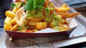 Guacamole fries - if you want this to be made vegan, make sure you ask for vegan mayo and to take out the parmesan at Friet Elite in Maastricht