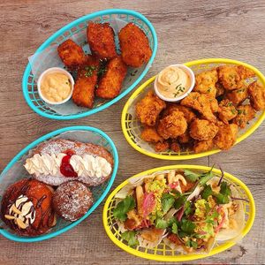 Mac'n'cheese bites, fried cauliflower, donuts (jam and cream and notella), ginger kiss, and chick'n tacos. at Hello Rosie in Hamilton