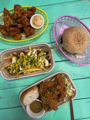 Fried cauliflower, chick'n burger, loaded fries, and the chick'n dinner box. at Hello Rosie in Hamilton