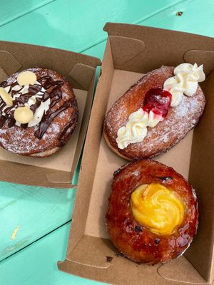 Donuts! Notella, jam and cream, and creme brûlée. at Hello Rosie in Hamilton