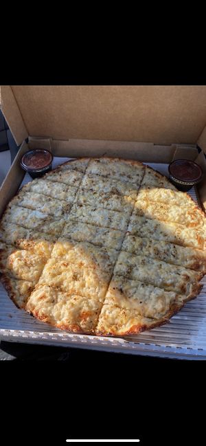 Large cheesy bread. Because it’s so darn good lol  at Ohio Pie in Brunswick