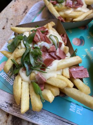 Cheesy Fries (with added bacon)  at Vedang - green burger | Mall of Berlin in Berlin