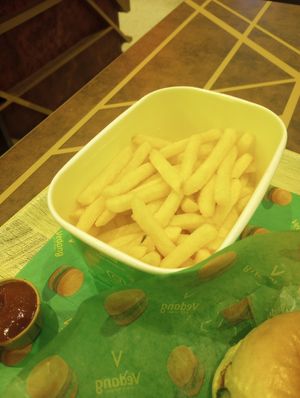 Fries , dip, and a small sliver of the plant based crispy chicken sandwich at Vedang - green burger | Mall of Berlin in Berlin