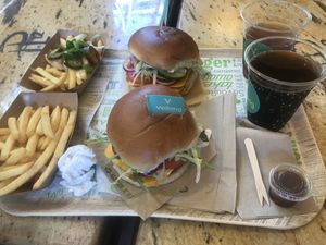 Burgers, fries and iced tea/ cola at Vedang - green burger | Mall of Berlin in Berlin