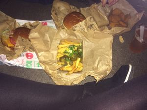 The two choices of chicken burger, chicken nuggets ans chilli cheese fries  at Vedang - green burger | Mall of Berlin in Berlin