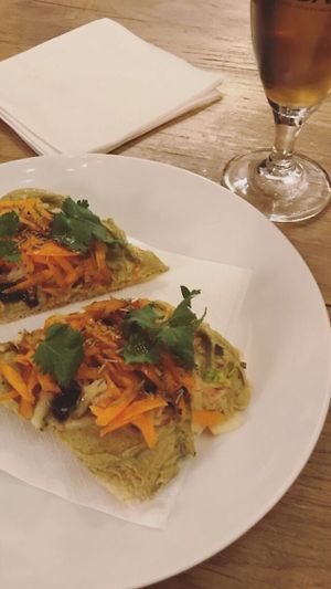Libaneses hummus toast with vegetables  at Bar Hola Flora in Burgos