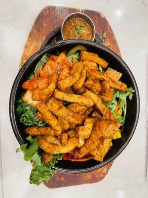 Mexibibimbap (bowl is the size of my head, lots of rice and veggies underneath)  at Lalo in Cincinnati