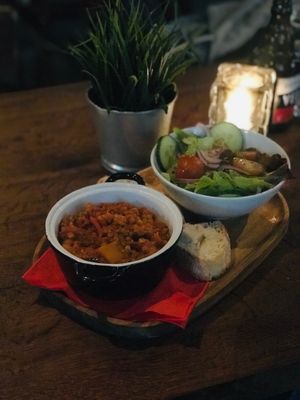 ‘Vegan lentil stoof, with bread and a small salad’ 
Had a nice dinner, the dish was tasteful.  at Café Forum in Maastricht