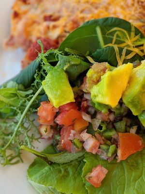 Green salad with avocado and enchilada. at Costa Dulce Beach Retreat in San Juan Del Sur