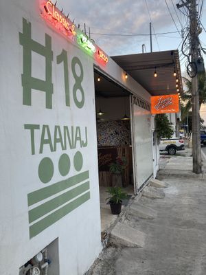 Outside of Jonny Como pizza - look out for the orange sign as you walk from the main part of town  at Jonny Como Pizza in Playa Del Carmen