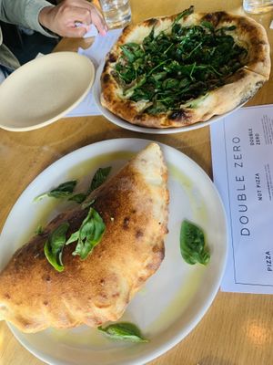 Truffle pizza (top) and meatball calzone (bottom) at Double Zero in Venice