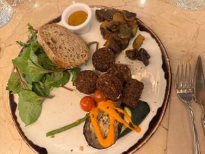 Falafel with mushrooms and grilled veggies on mango/mustard sauce at Margarito in Bilbao