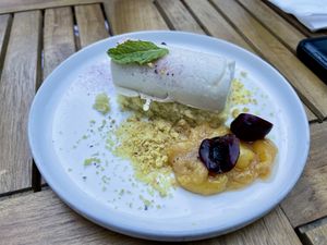 Vanilla panna cotta with lemon sponge cake, lemon crunch and fresh cherries… so light and delicious!!  at Frankie We Salute You! in Kelowna