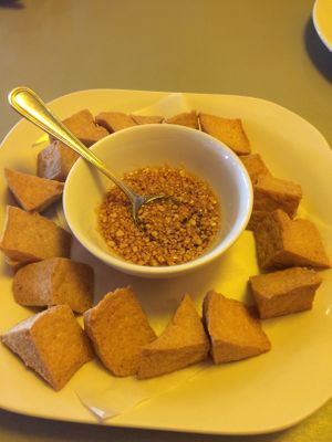 Crispy tofu appetizer with dipping sauce.   at The Thai Bistro in El Centro